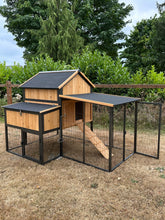 Cottage coop made with metal frame. New and predator proof