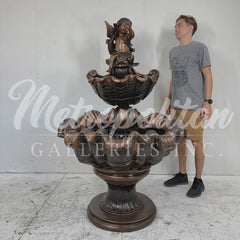 Bronze Putto on Fish Shell Fountain